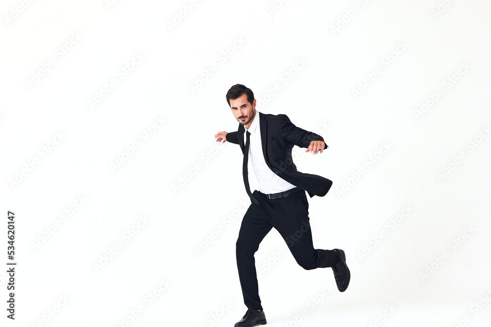 Man business smile with teeth in costume running and jumping up open mouth happiness and surprise full-length on white isolated background copy place Man business smile with teeth in costume running and jumping up open mouth happiness and surprise full-length on white isolated background copy place