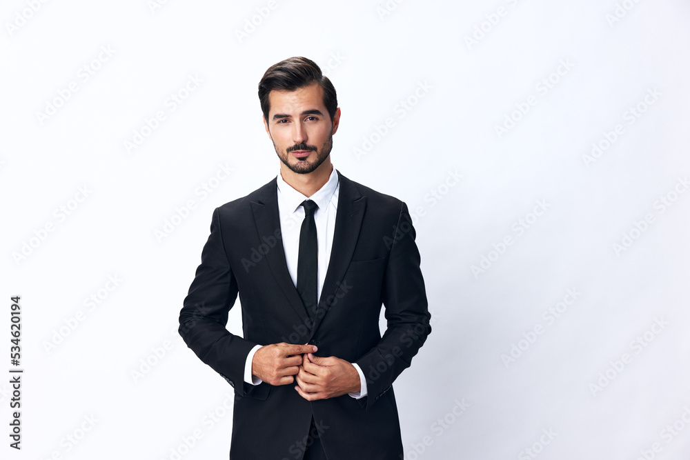Portrait of a man in an expensive business suit on a white background ...