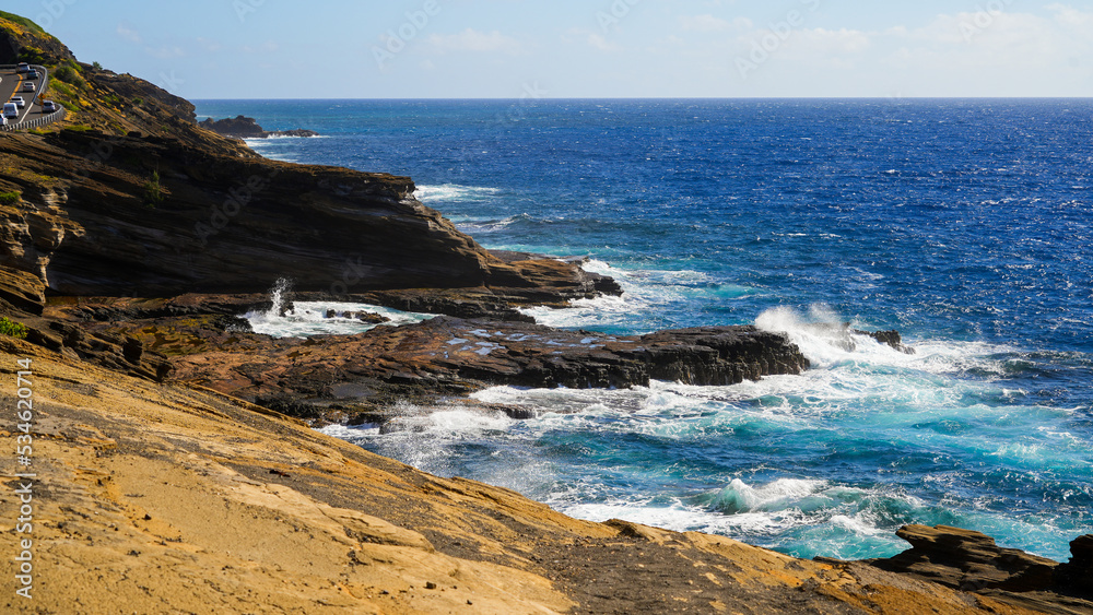 Waves on the rocky coast of O'ahu island in Hawaii from the Lana'i lookout along the Kalaniana'ole Highway