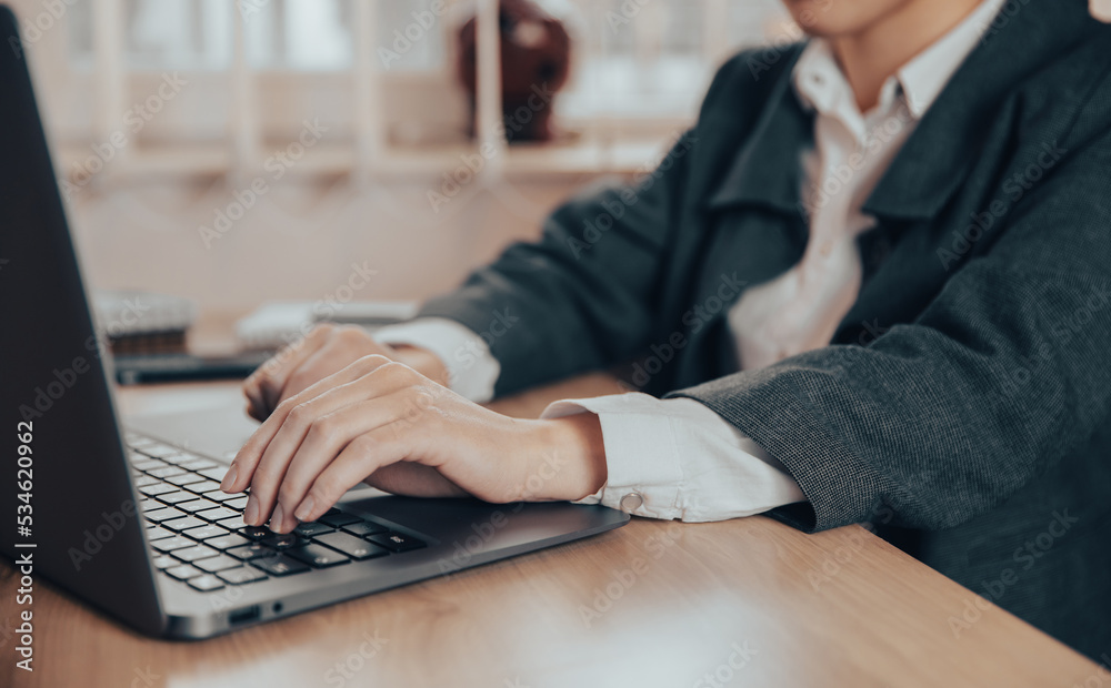 Businesswoman working with laptop