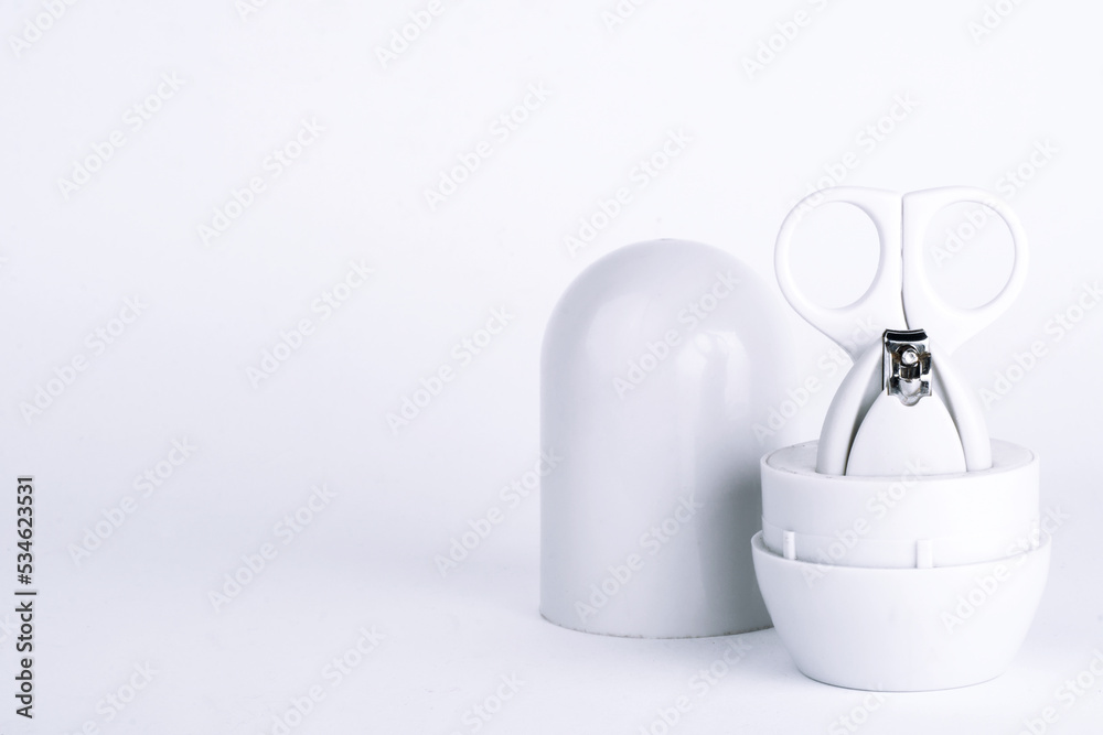 scissor and nail clippers for babies on white background scissor and nail clippers for babies on white background