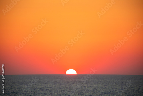 orange sunset over the sea © Alyssa