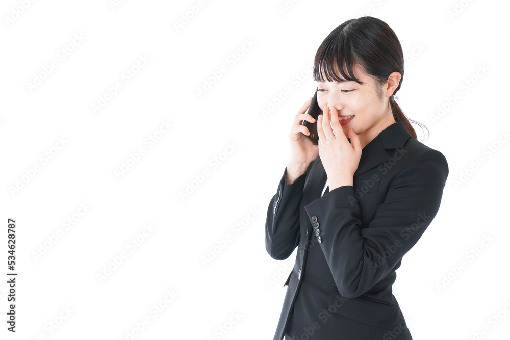 Businesswoman wearing talking on phone Businesswoman wearing talking on phone