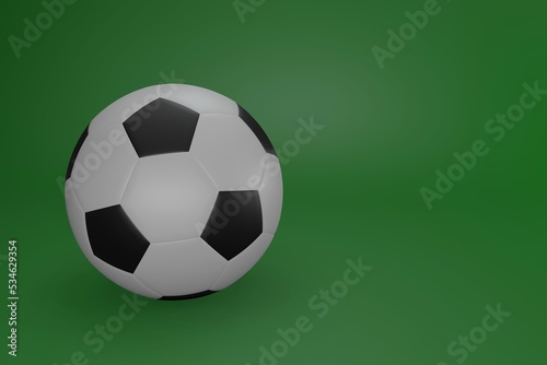 Soccer ball isolated on green background