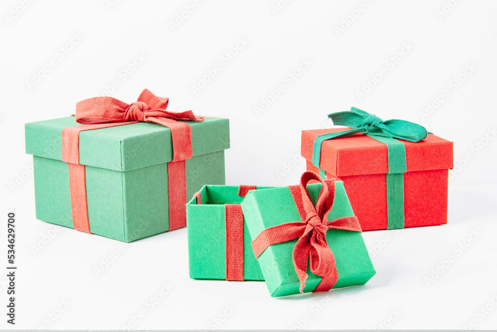 Present. Gift box with a bow. New Year's surprise. Red and green box with a gift Present. Gift box with a bow. New Year's surprise. Red and green box with a gift