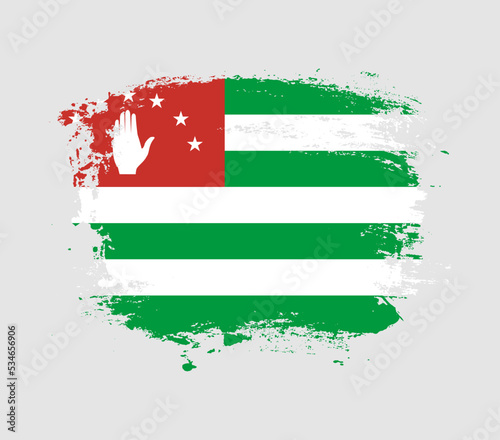 Elegant grungy brush flag with Abkhazia national flag vector