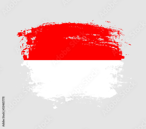 Elegant grungy brush flag with Indonesia national flag vector