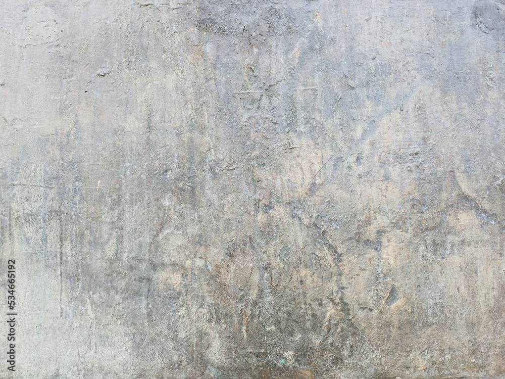 Fototapeta premium Aged wall background. rough stone texture. cracked and scratched backdrop