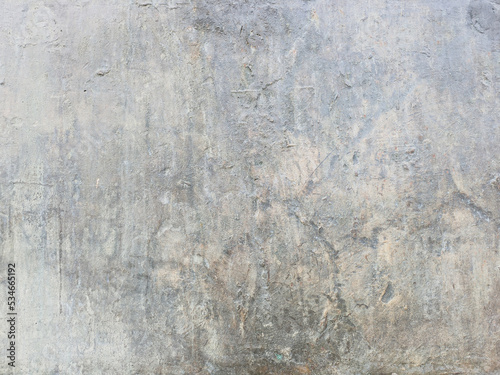 Aged wall background. rough stone texture. cracked and scratched backdrop