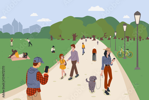 City park with people walking, relaxing in nature - walking the dog, sunbathing, listening to music, talking