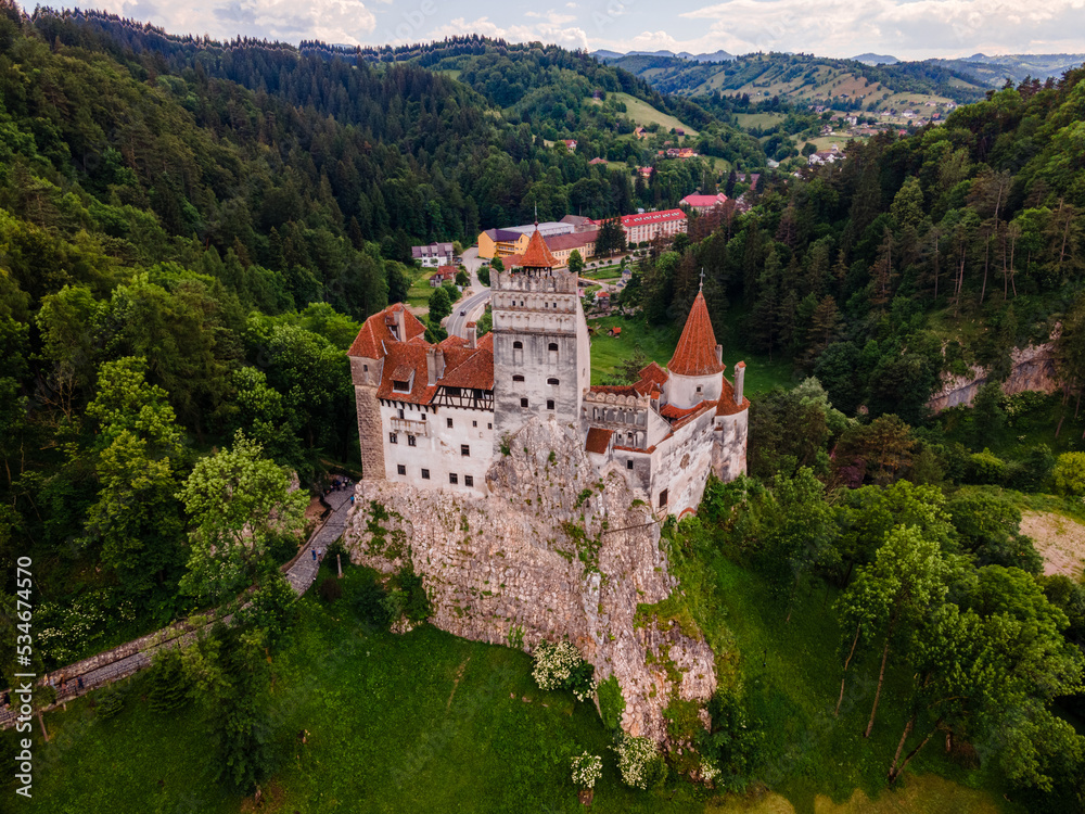 Aerial photography over Bran castle in Brasov, Romania. Photography was shot from a drone at a higher altitude with camera pointing downwards for a top view.