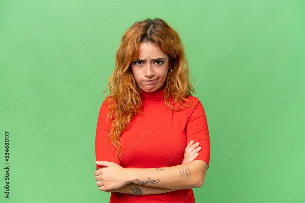 Young caucasian woman isolated on green screen chroma key background feeling upset Young caucasian woman isolated on green screen chroma key background feeling upset