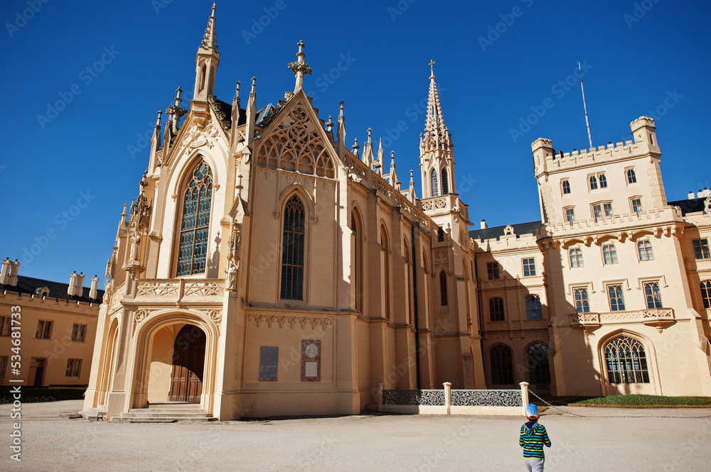 Boy explore in Lednice castle in Czech republic.