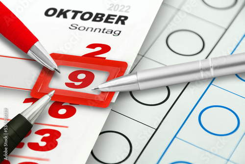 Deutscher Kalender 9. Oktober 2022  Landtagswahl in Niedersachsen und Kugelschreiber rot schwarz photo