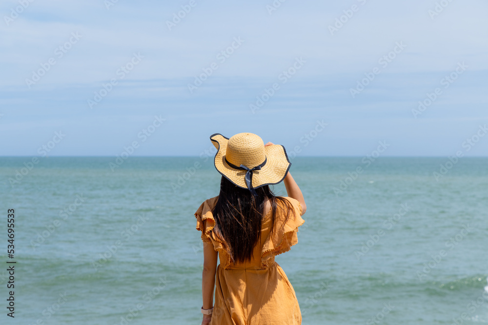 Woman on the sand beach