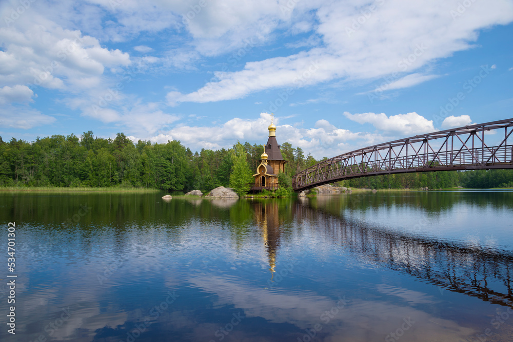 Summer landscape with Vuoksa river and Church of St. Andrew the First-Called. Leningrad region, Russia