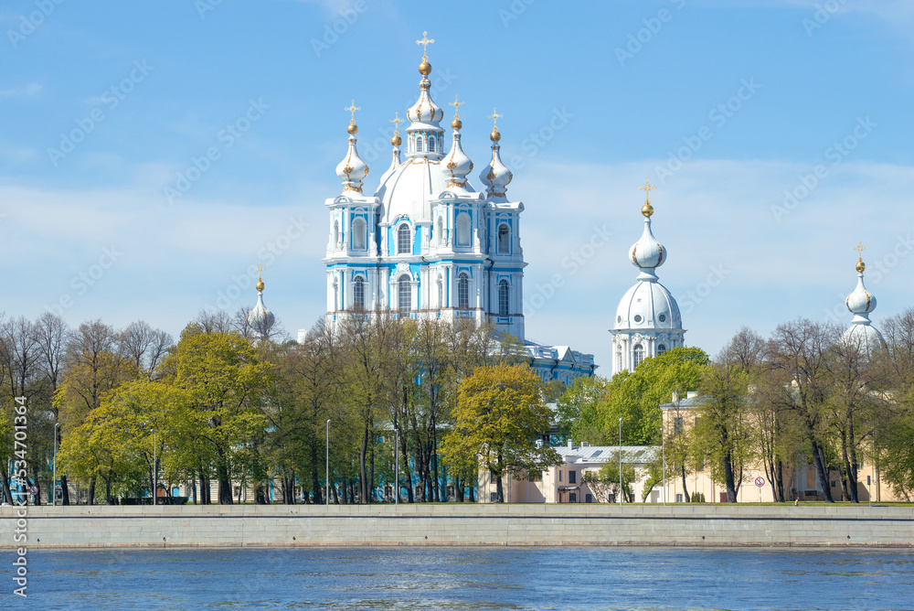 View of the Smolny Cathedral from the Neva river on a May sunny day. Saint-Petersburg, Russia