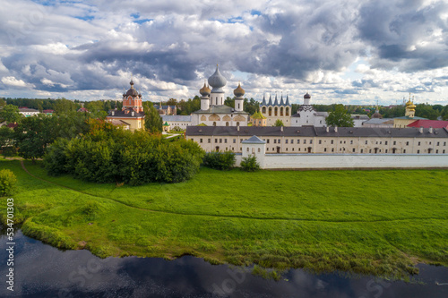 The old Tikhvin Assumption Monastery under a cloudy sky on an August day (shooting from a quadcopter). Leningrad Oblast, Russia