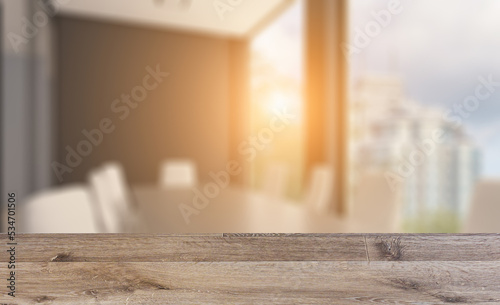 Modern office building interior. 3D rendering.. Sunset.. Background with empty wooden table. Flooring.