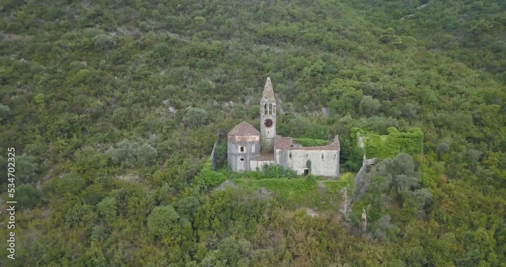 Beautiful old church in Kotor bay in Montenegro. This place looks like a Caribbean. Medieval church was destroyed during the earthquake. Landscape video content in 4k resolution. Beautiful old church in Kotor bay in Montenegro. This place looks like a Caribbean. Medieval church was destroyed during the earthquake. Landscape video content in 4k resolution.
