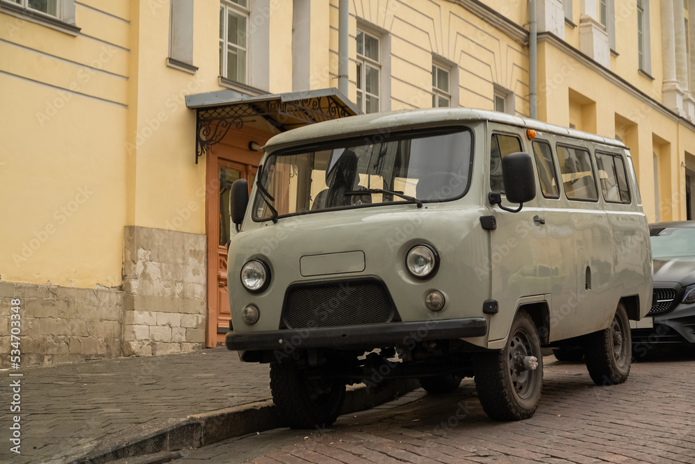 restyled retro uaz bus nicknamed bukhanka parked in the street