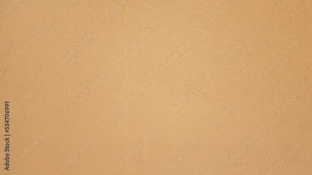 Orange painted plaster wall. Orange painted plaster wall.