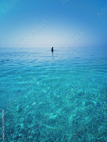 man on surfboard in the mediterranean sea 