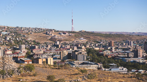 Yerevan, Armenia, beautiful super-wide angle panoramic view of Yerevan with Mount Ararat, cascade complex, mountains and scenery beyond the city, summer sunny day photo