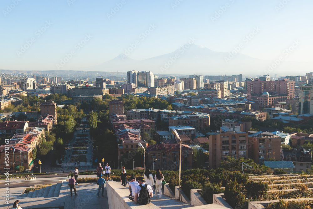 Yerevan, Armenia, beautiful super-wide angle panoramic view of Yerevan with Mount Ararat, cascade complex, mountains and scenery beyond the city, summer sunny day
