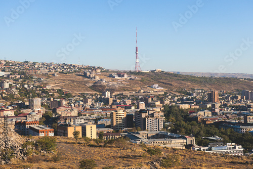 Yerevan, Armenia, beautiful super-wide angle panoramic view of Yerevan with Mount Ararat, cascade complex, mountains and scenery beyond the city, summer sunny day photo