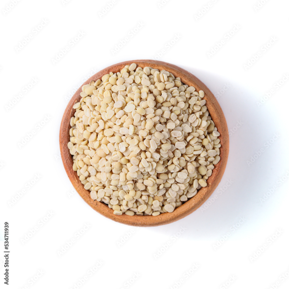 White Lentils (Urad Dal). White Lentils in Pottery on white background White Lentils (Urad Dal). White Lentils in Pottery on white background