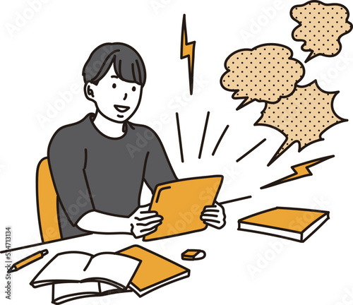 勉強中にタブレットを見る学生	