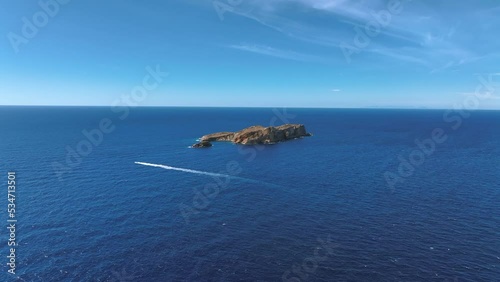 Small Island off the West Coast of Ibiza in the Summer Aerial View photo