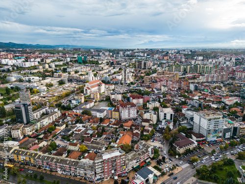 Fototapeta Naklejka Na Ścianę i Meble -  Pristina Modern City Center and Residential Buildings. Aerial View over Capital of Kosovo. Balkans. Europe. 