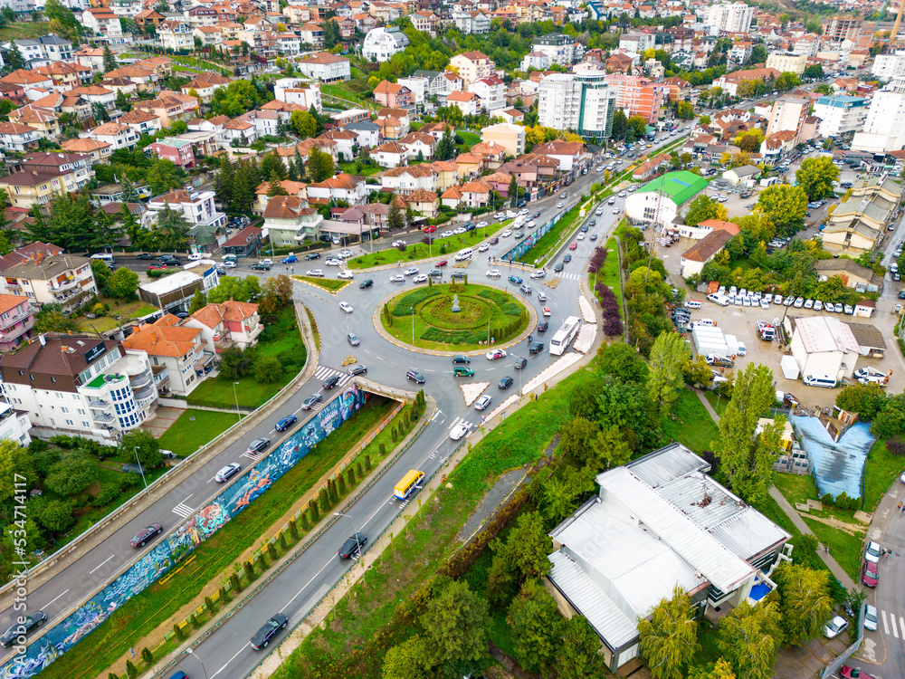 Fototapeta premium Pristina Modern City Center and Residential Buildings. Aerial View over Capital of Kosovo. Balkans. Europe. 