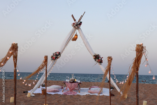 Beach wedding set up, tropical outdoor wedding proposal.