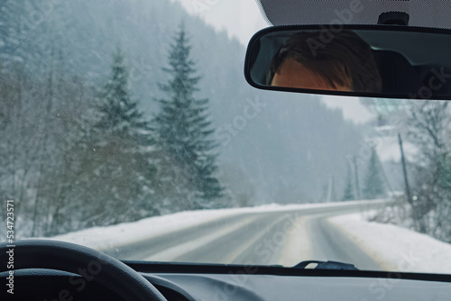 Driving through the winter snowy forest © Diana Vyshniakova