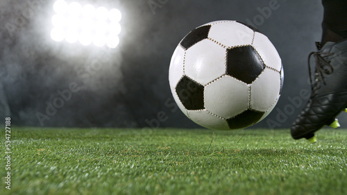 Close-up of Football Player Kicking Soccer Ball © Lukas Gojda