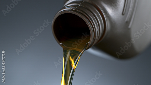 Pouring Oil from Plastic Co...