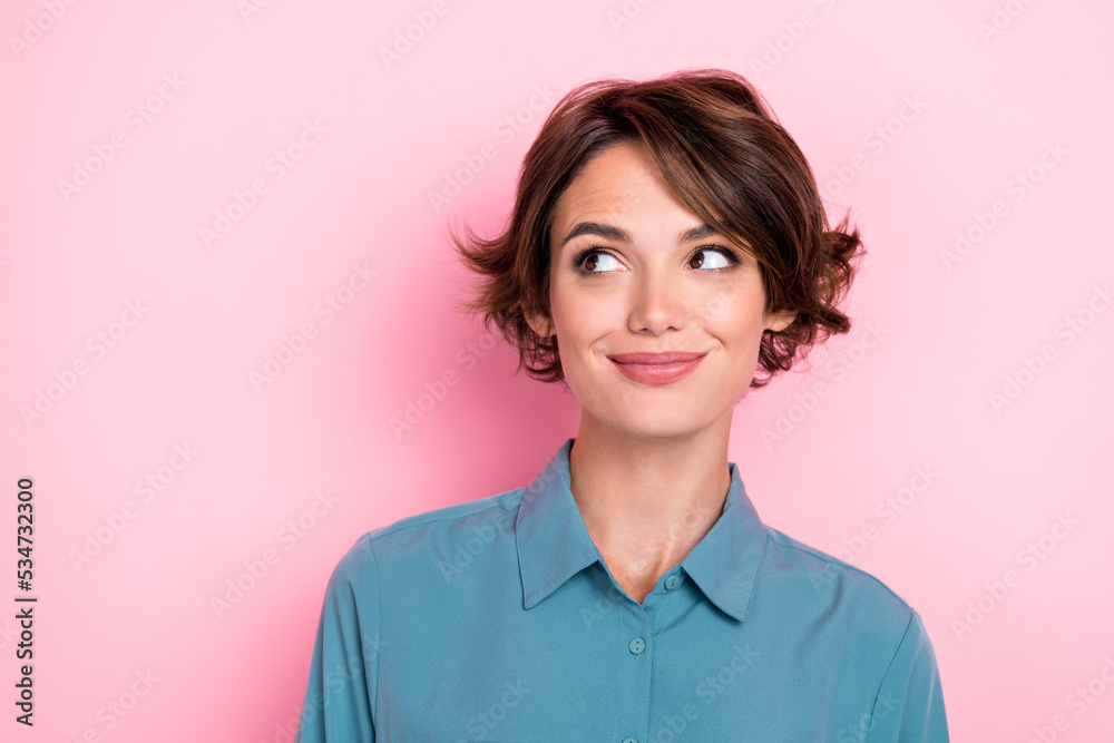 Photo of nice cute adorable optimistic girl with bob hairdo wear blue formalwear look empty space isolated on pink color background Photo of nice cute adorable optimistic girl with bob hairdo wear blue formalwear look empty space isolated on pink color background
