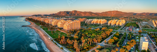 Oropesa del Mar - Marina d'Or Panorama  from the air during sunrise photo