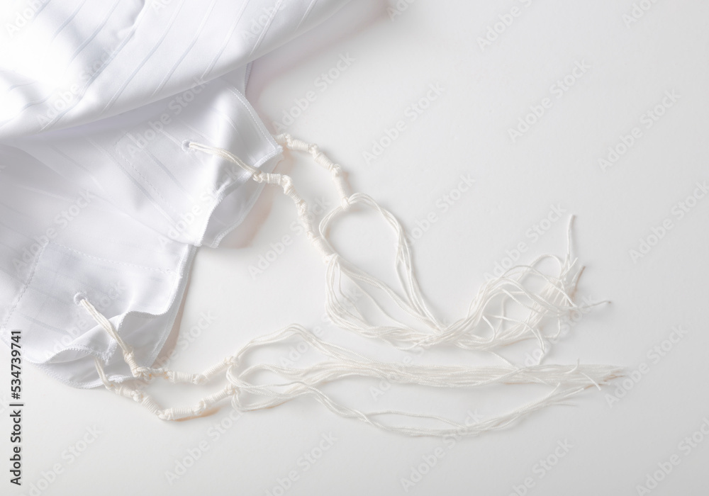 Tallit katan, background. Jewish national and religious tallith katan