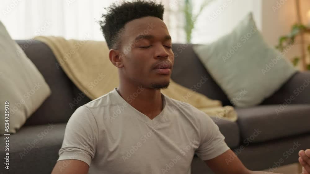 Black couple, meditation and love bond in house living room or house interior in relax, zen mental health or peace wellness. Happy, smile or comic woman helping man in mind exercise for chakra energy