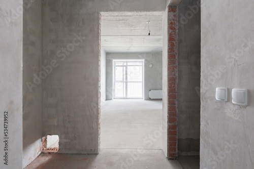 interior of the apartment without decoration in gray colors