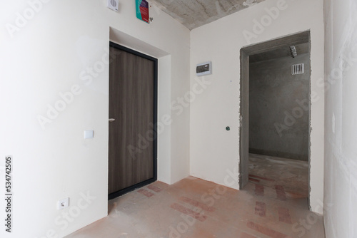 interior of the apartment without decoration in gray colors