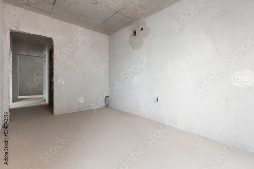 interior of the apartment without decoration in gray colors