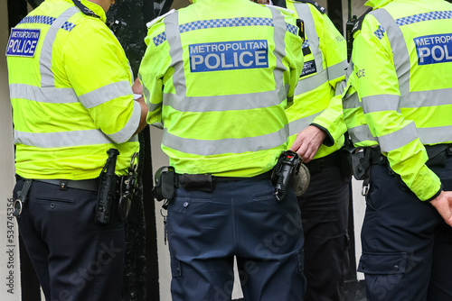 Metropolitan Police officer back of the vest in London photo