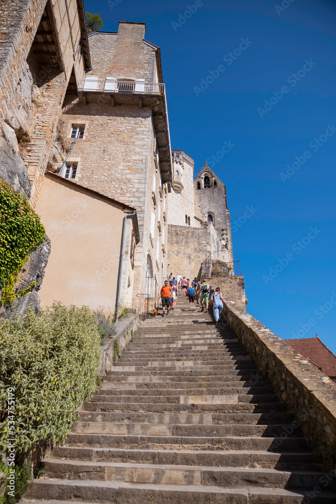 people on the stais of rocamadour in france