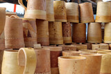 birch bark mugs lined up at a fair