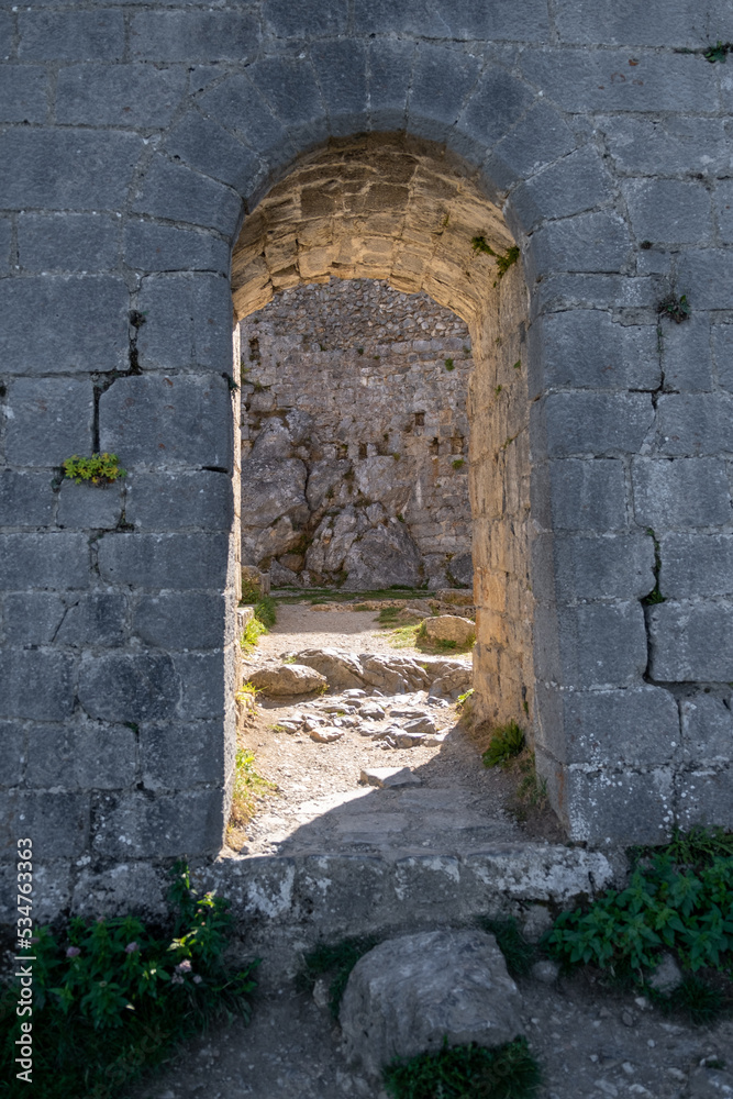 Walls of the Montsegur Castle, Ariege, Occitanie, France. Detail of a entrance